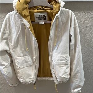 The North Face White and Yellow Jacket